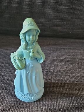 Vintage Avon Little Girl Blue Figurine with full Heres My Heart cologne Bottle.